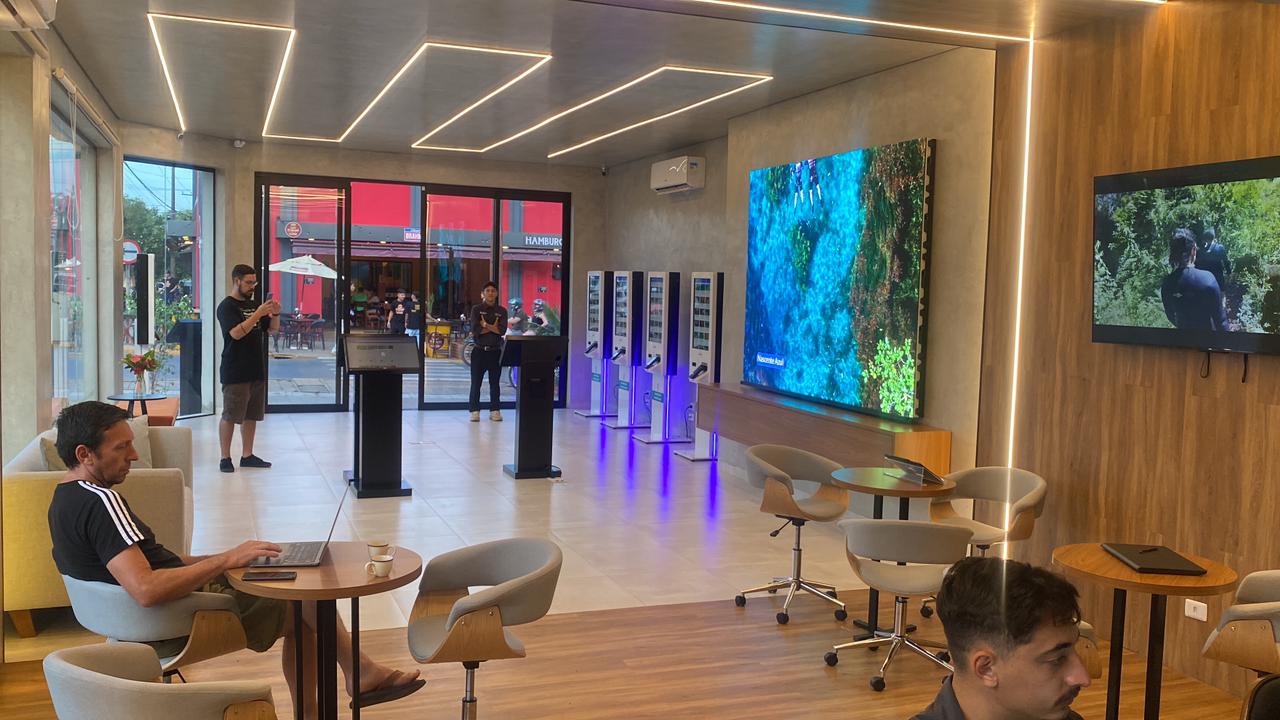 Self-service kiosks in a visitor experience center · Brazil